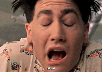 A Close Up Of A Man 'S Face With His Mouth Open And The Words Mom Visible GIF