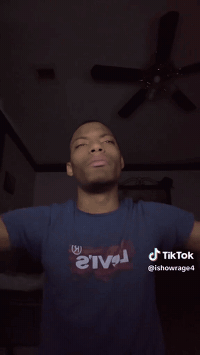 A Close Up Of A Man 'S Face With His Tongue Out And A Tiktok Watermark GIF