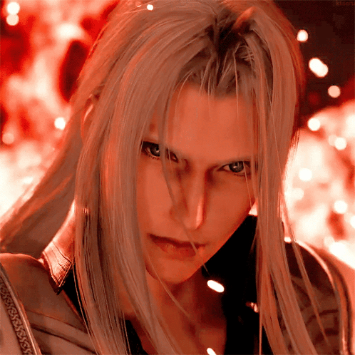 A Close Up Of A Man 'S Face With Long White Hair GIF