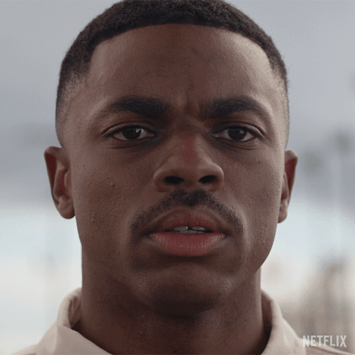 A Close Up Of A Man 'S Face With Netflix Written On The Bottom Right GIF