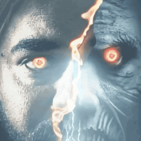 A Close Up Of A Man 'S Face With Red Eyes And A Skull In The Background GIF