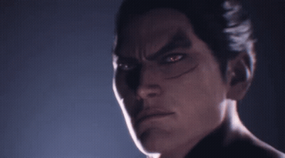 A Close Up Of A Man 'S Face With Red Eyes Looking At The Camera GIF