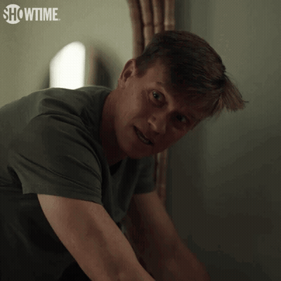 A Close Up Of A Man 'S Face With Showtime Written In The Corner GIF