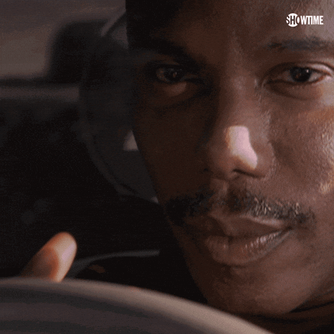 A Close Up Of A Man 'S Face With Showtime Written On The Top GIF