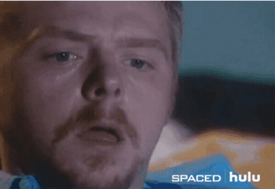 A Close Up Of A Man 'S Face With Spaced Hulu In The Corner GIF