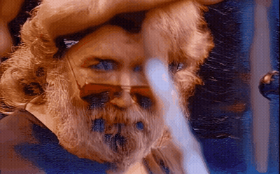 A Close Up Of A Man 'S Face With Sunglasses On GIF