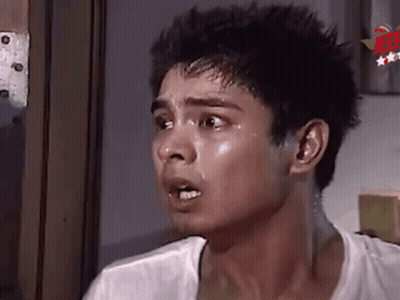 A Close Up Of A Man 'S Face With Sweat Coming Out Of His Face And Neck . GIF