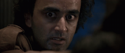 A Close Up Of A Man 'S Face With Sweat Coming Out Of His Face GIF