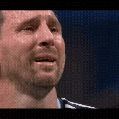 A Close Up Of A Man 'S Face With Sweat On His Face GIF