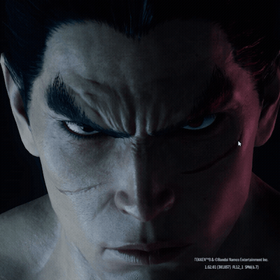 A Close Up Of A Man 'S Face With Tekken Written On The Bottom Left GIF