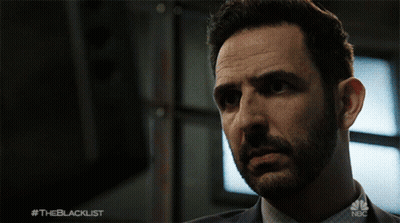 A Close Up Of A Man 'S Face With The Blacklist Written On The Bottom GIF