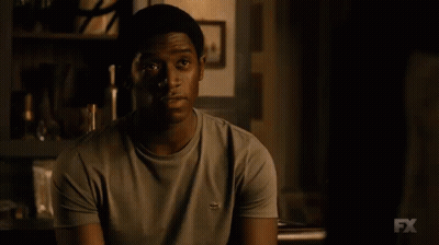 A Close Up Of A Man 'S Face With The Fx Logo Visible GIF