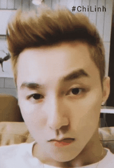 A Close Up Of A Man 'S Face With The Hashtag #Chilinh Written Above Him GIF