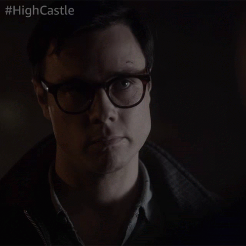A Close Up Of A Man 'S Face With The Hashtag #Highcastle On The Bottom GIF
