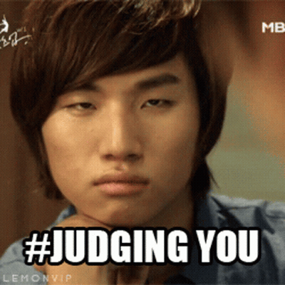 A Close Up Of A Man 'S Face With The Hashtag # Judging You GIF