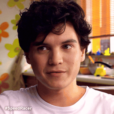 A Close Up Of A Man 'S Face With The Hashtag #Speedracer Visible GIF