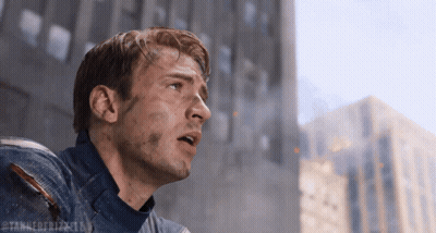A Close Up Of A Man 'S Face With The Hashtag Tannedfrizzels GIF
