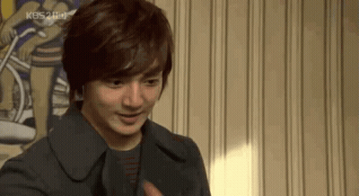 A Close Up Of A Man 'S Face With The Kbs2 Hd Logo On The Bottom Right GIF