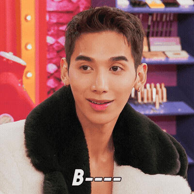 A Close Up Of A Man 'S Face With The Letter B Below It GIF
