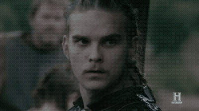 A Close Up Of A Man 'S Face With The Letter H On The Bottom GIF