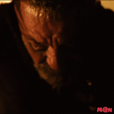 A Close Up Of A Man 'S Face With The Letter M On The Bottom Right Corner GIF