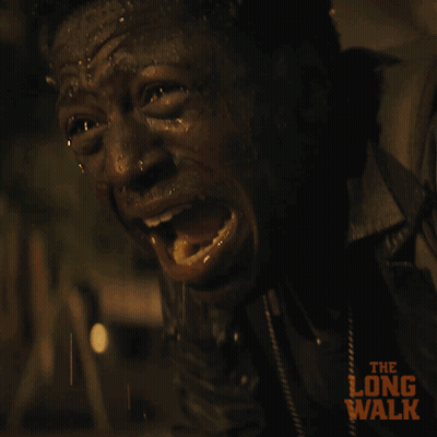 A Close Up Of A Man 'S Face With The Long Walk Written On It GIF