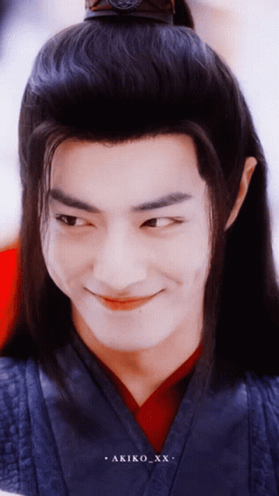 A Close Up Of A Man 'S Face With The Name Akiko_xx On The Bottom Right GIF