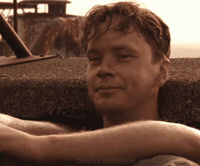 A Close Up Of A Man 'S Face With The Name David Worren On The Bottom Right GIF
