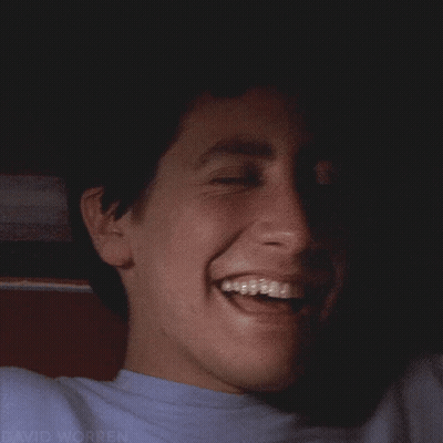 A Close Up Of A Man 'S Face With The Name David Worren Visible GIF