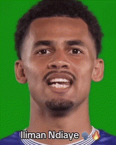 A Close Up Of A Man 'S Face With The Name Ilman Ndaye On The Bottom GIF