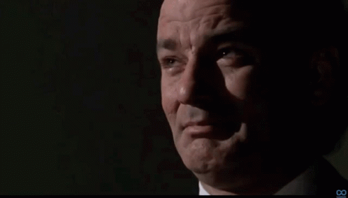 A Close Up Of A Man 'S Face With The Number 8 On The Bottom GIF