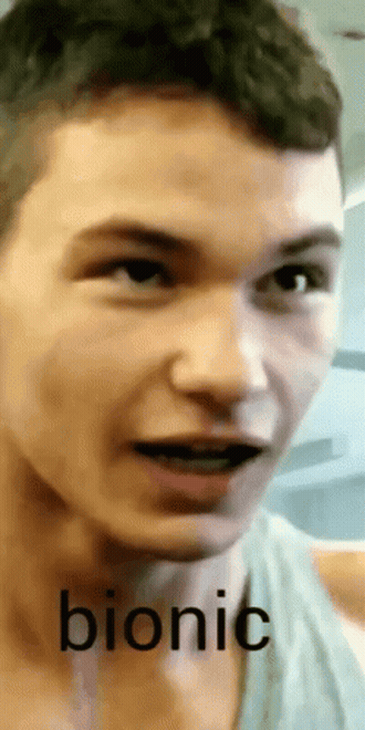 A Close Up Of A Man 'S Face With The Word Bionic Written Below It GIF