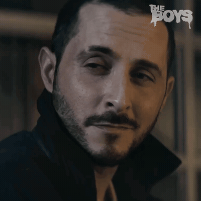 A Close Up Of A Man 'S Face With The Word Boys On The Bottom Right GIF