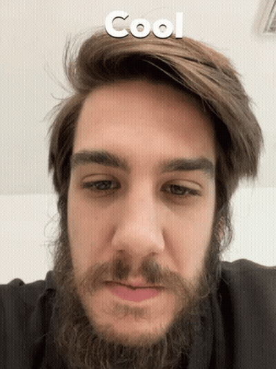 A Close Up Of A Man 'S Face With The Word Cool Written Above Him GIF