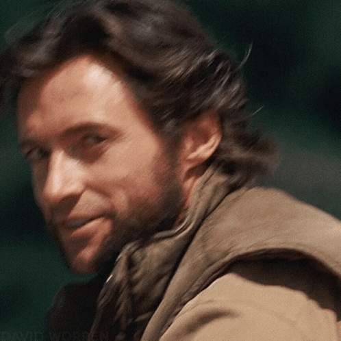 A Close Up Of A Man 'S Face With The Word David Written Below Him GIF