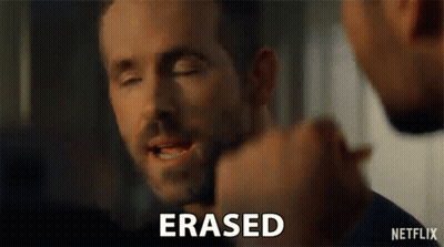 A Close Up Of A Man 'S Face With The Word Erased In Front Of Him . GIF