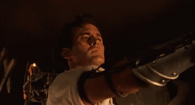 A Close Up Of A Man 'S Face With The Word Groovy Written Above Him GIF