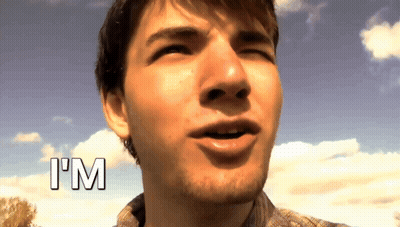 A Close Up Of A Man 'S Face With The Word I 'M Above Him GIF
