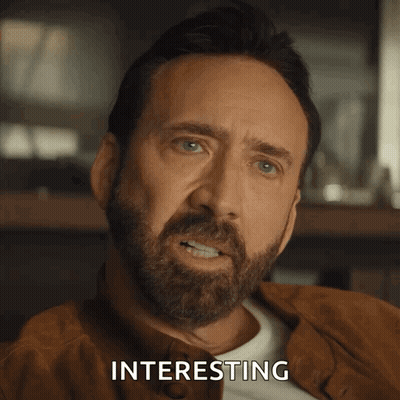 A Close Up Of A Man 'S Face With The Word Interesting Above Him GIF