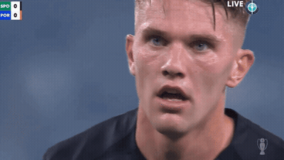 A Close Up Of A Man 'S Face With The Word Live On The Bottom GIF