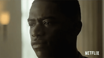 A Close Up Of A Man 'S Face With The Word Netflix On The Bottom Right . GIF