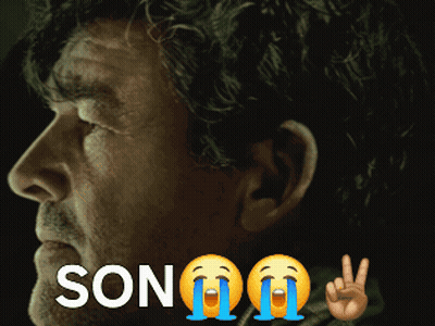 A Close Up Of A Man 'S Face With The Word Son On It GIF