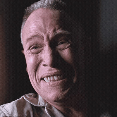 A Close Up Of A Man 'S Face With The Word Worren On The Bottom Left GIF