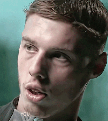 A Close Up Of A Man 'S Face With The Word You On The Bottom Right GIF