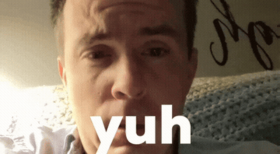 A Close Up Of A Man 'S Face With The Word Yuh Written Below It GIF