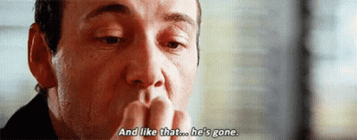A Close Up Of A Man 'S Face With The Words `` And Like That ... He 'S Gone '' Written On It . GIF