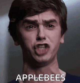 A Close Up Of A Man 'S Face With The Words Applebees In The Corner GIF