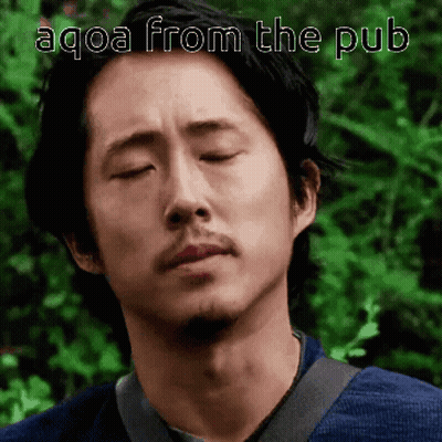 A Close Up Of A Man 'S Face With The Words Aqoa From The Pub Below Him GIF