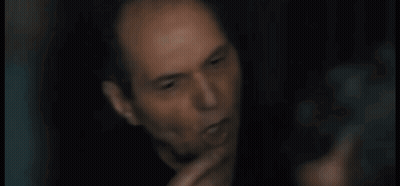 A Close Up Of A Man 'S Face With The Words Are You Stupid Below Him GIF