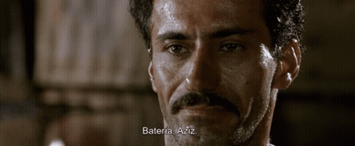 A Close Up Of A Man 'S Face With The Words Bateria Aziz Written Below Him GIF